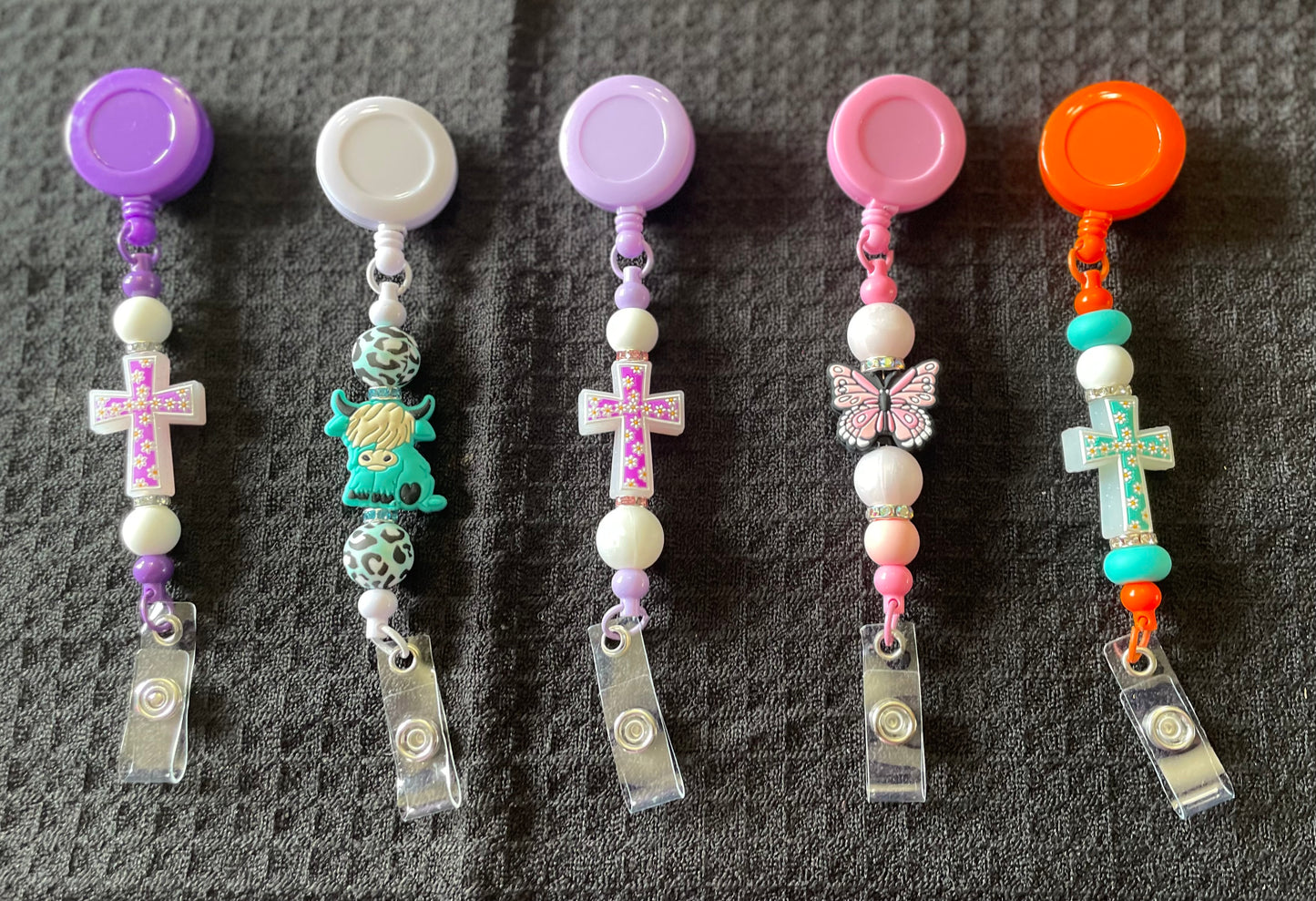 Badge reels with beads