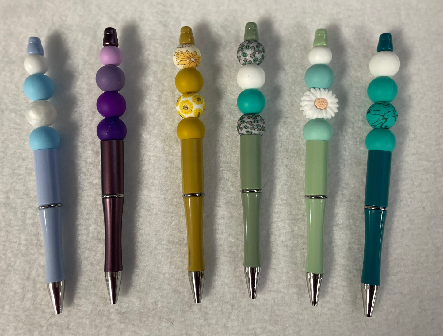 Black ink, pens with beads