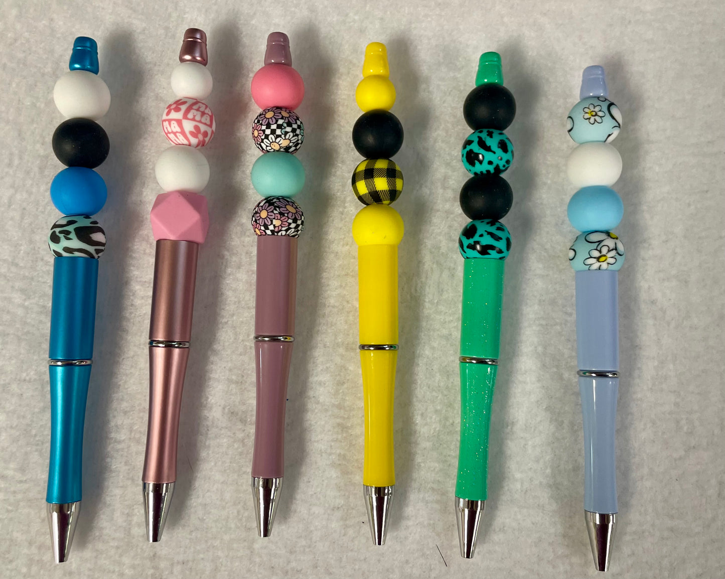 Black ink, pens with beads