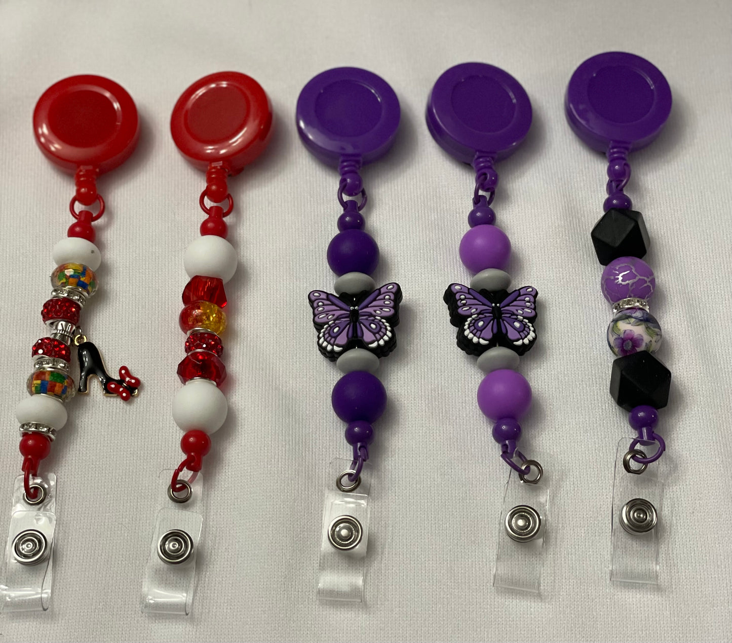 Badge reels with beads