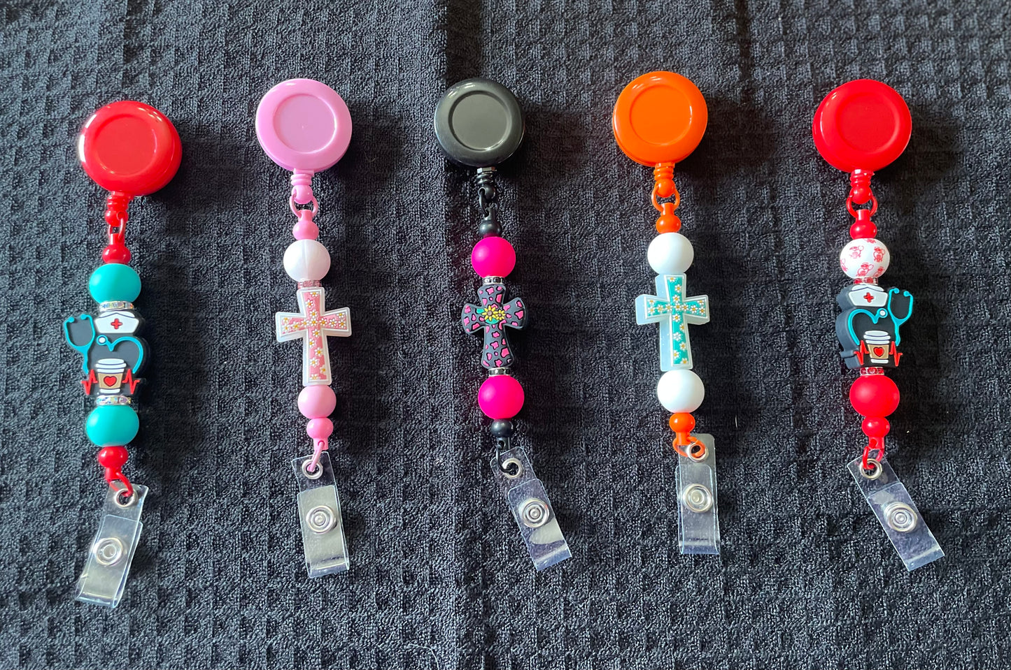 Badge reels with beads