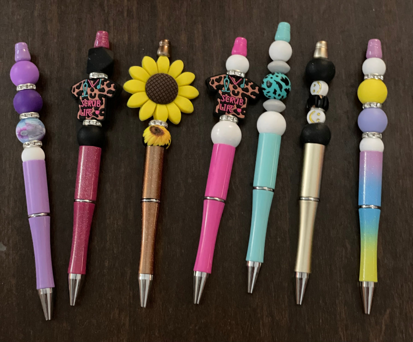 Black ink, pens with beads