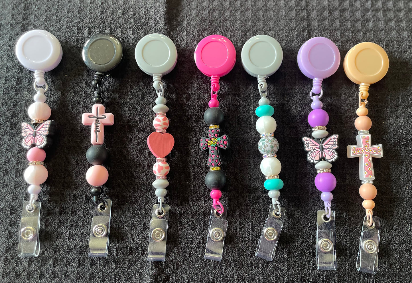 Badge reels with beads