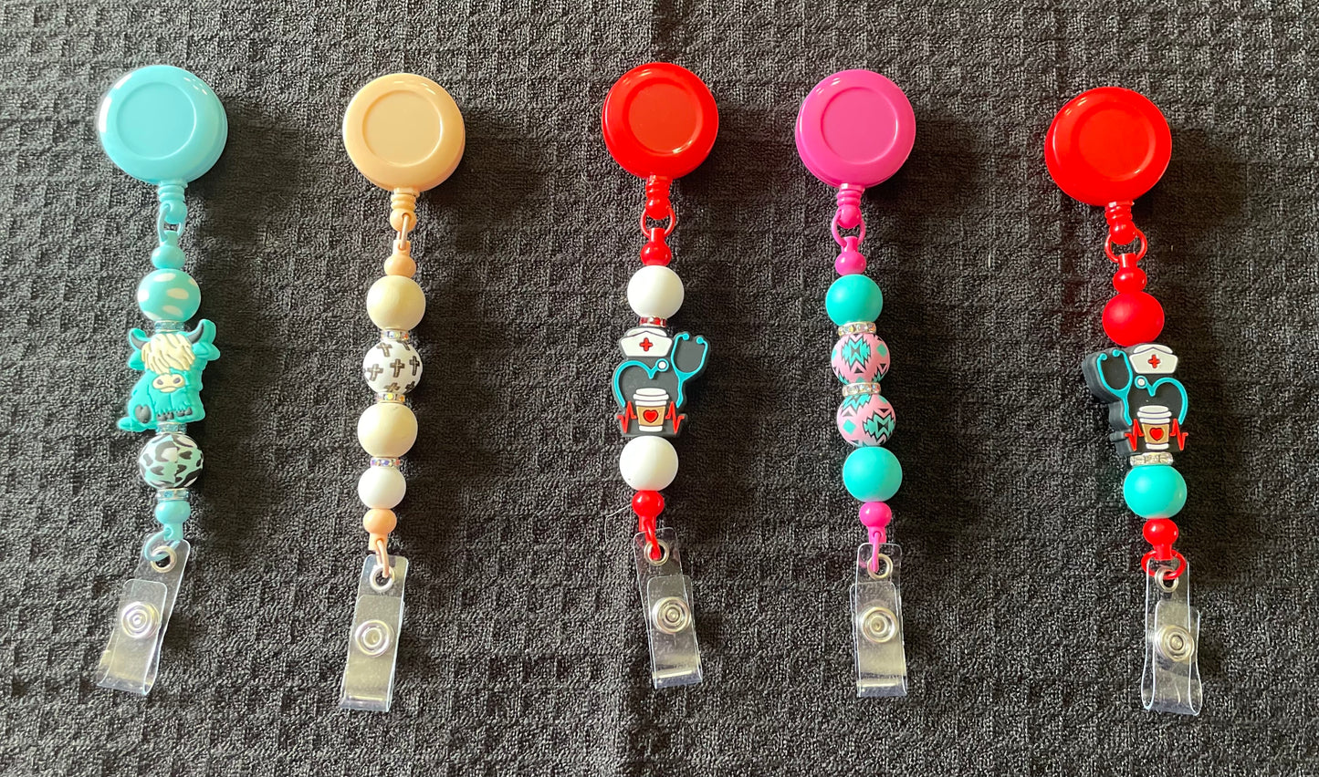Badge reels with beads