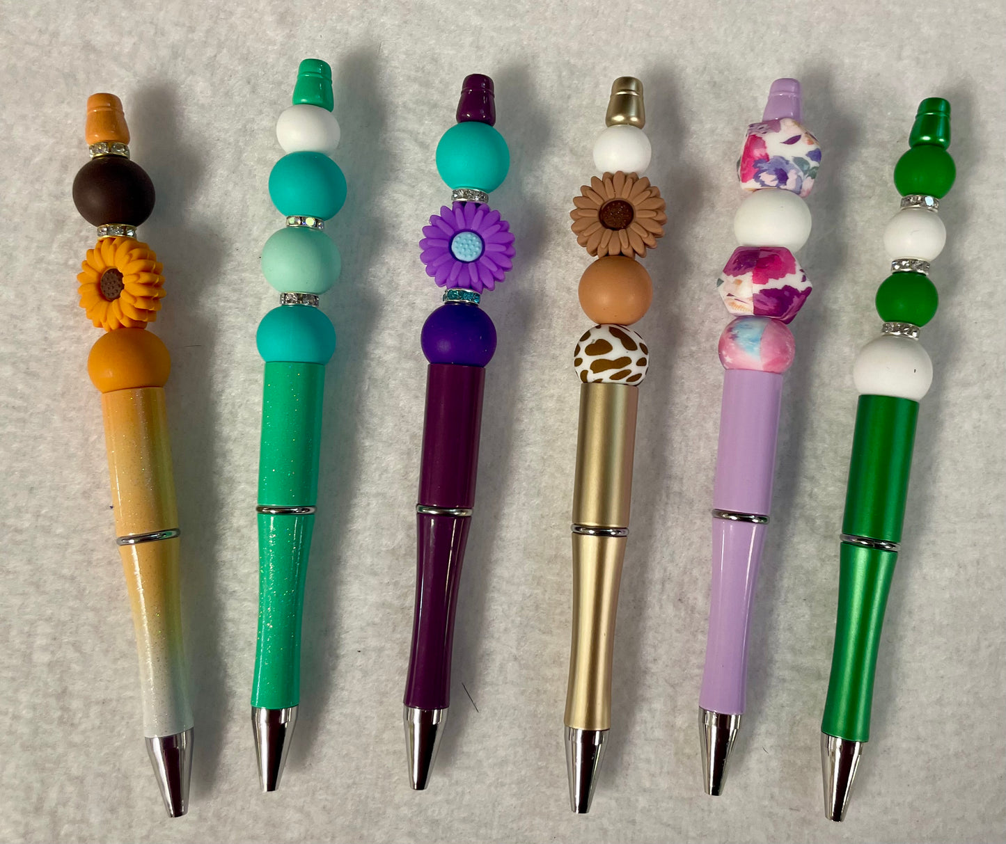 Black ink, pens with beads