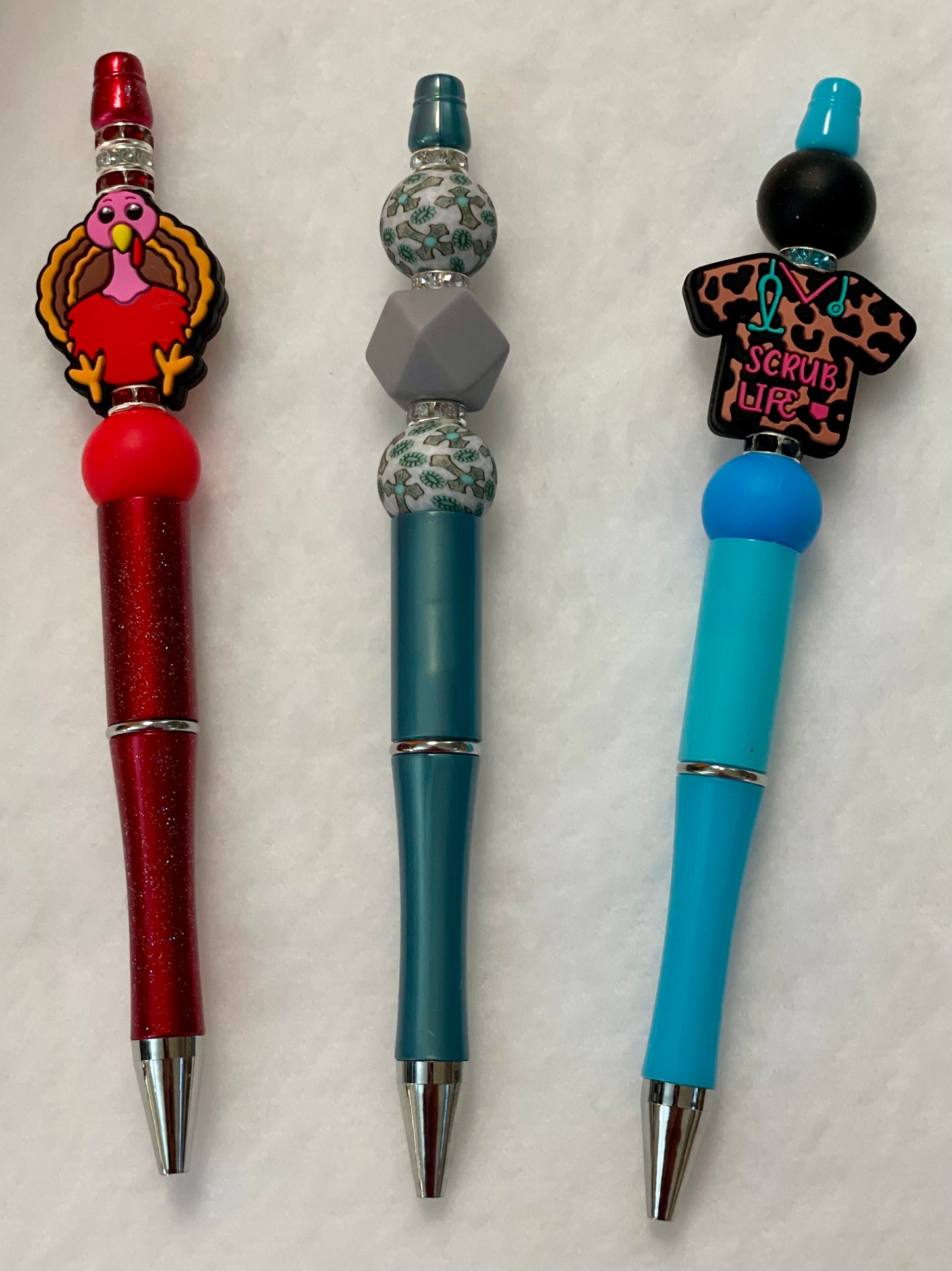 Black ink, pens with beads