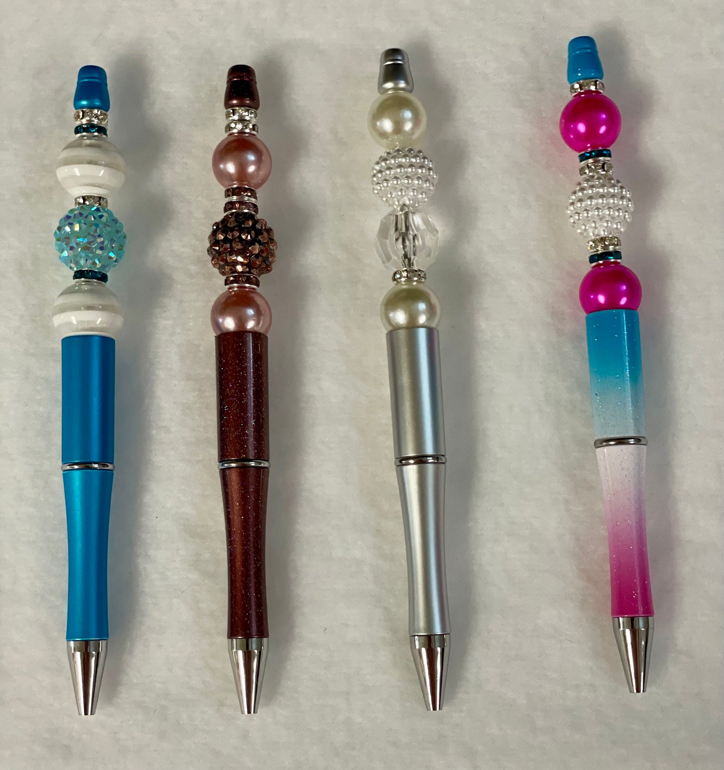 Black ink, pens with beads