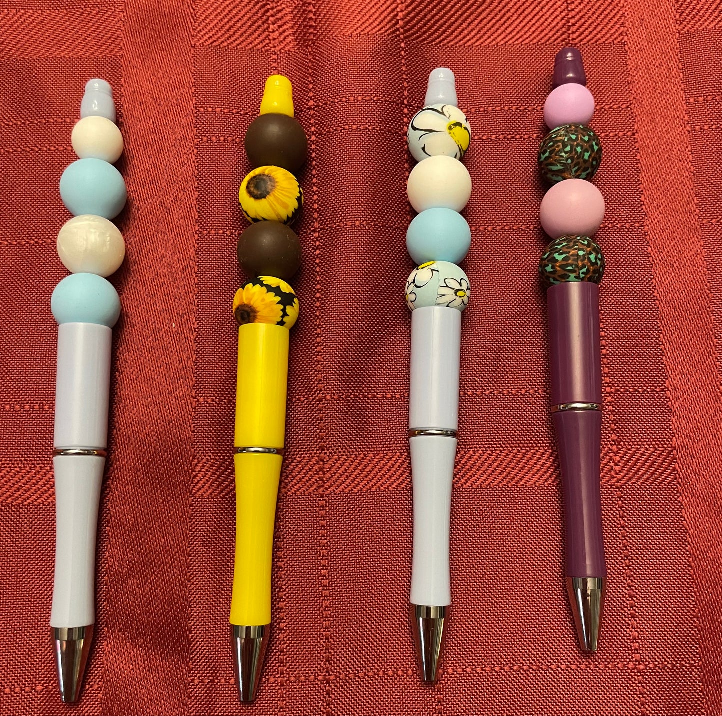 Black ink, pens with beads