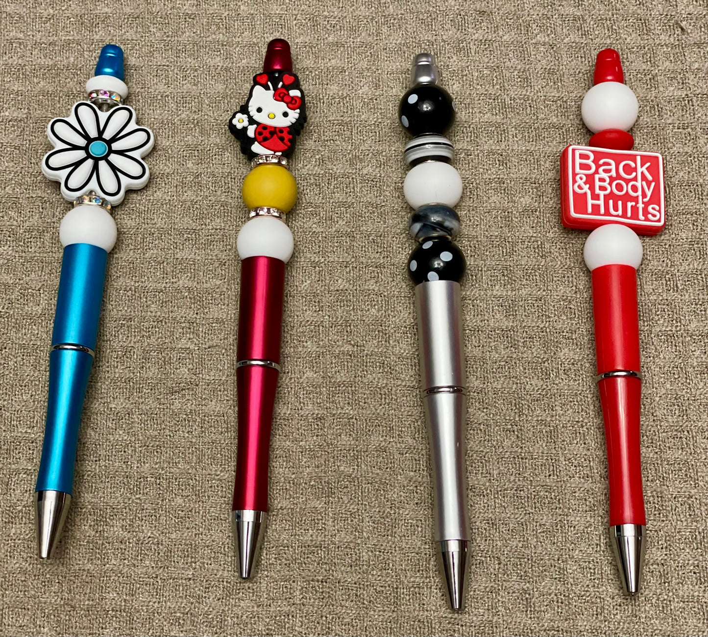 Black ink, pens with beads