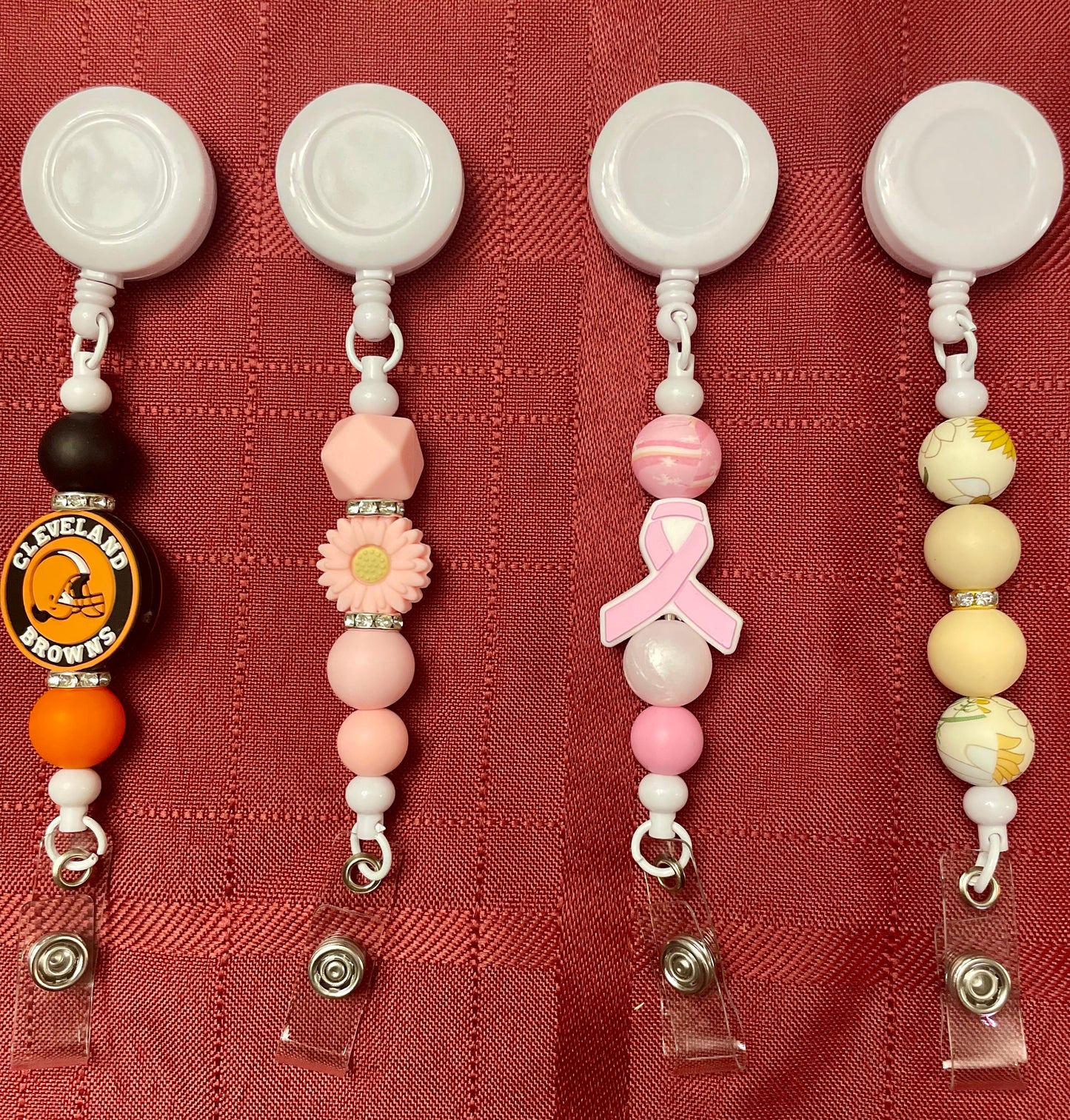 Badge reels with beads