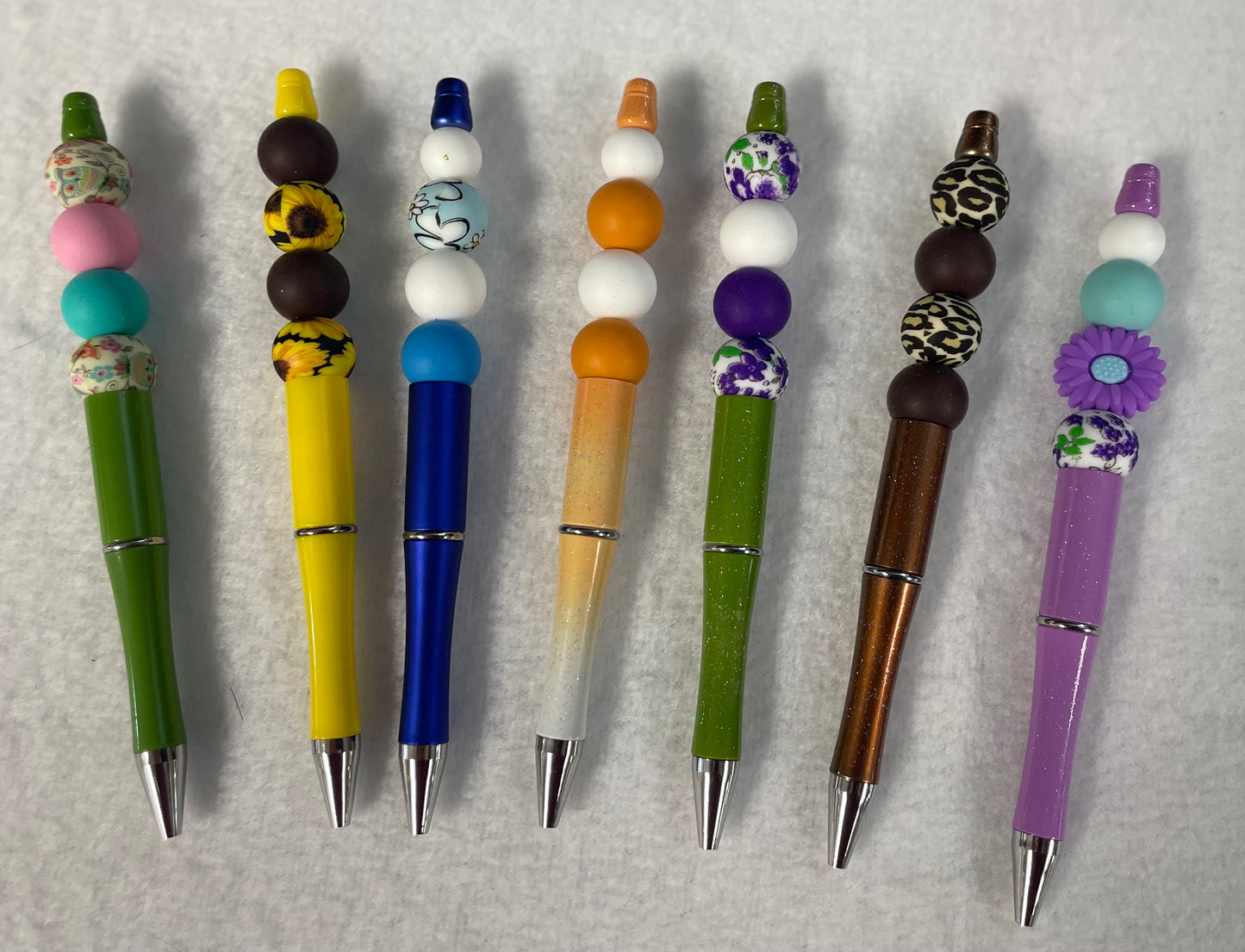 Black ink, pens with beads