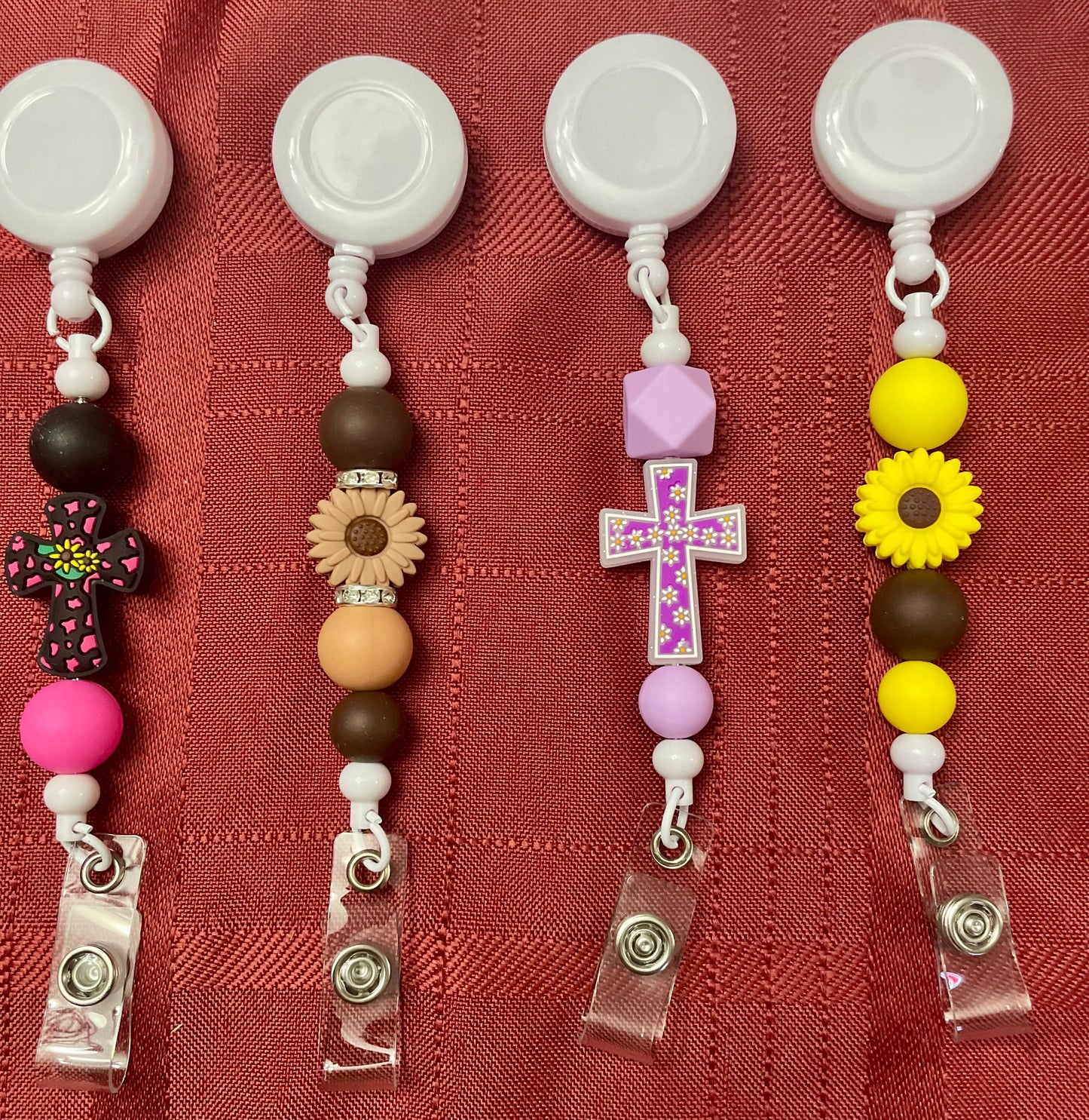Badge reels with beads