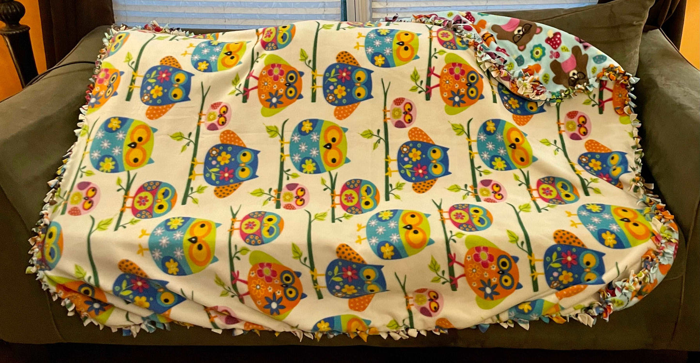 Cuddle up and stay warm with one of my medium size fleece tie knot blankets