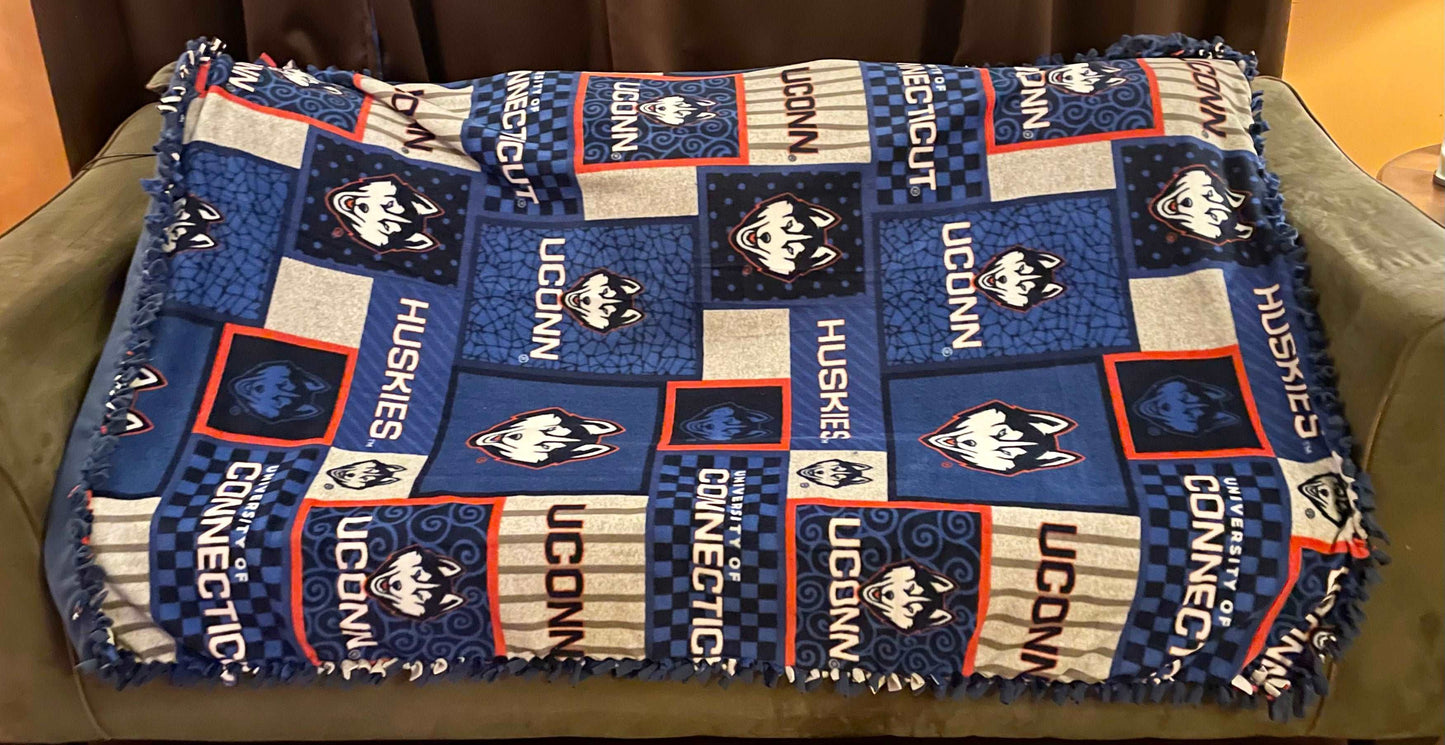 Cuddle up and stay warm with one of my medium size fleece tie knot blankets