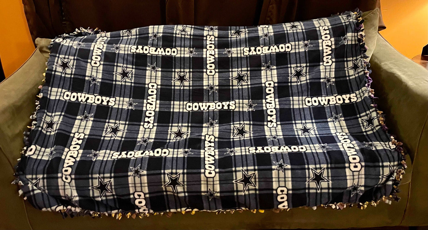 Cuddle up and stay warm with one of my medium size fleece tie knot blankets