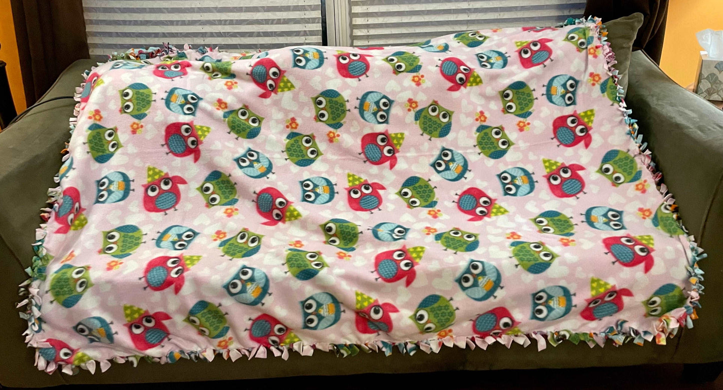Cuddle up and stay warm with one of my medium size fleece tie knot blankets