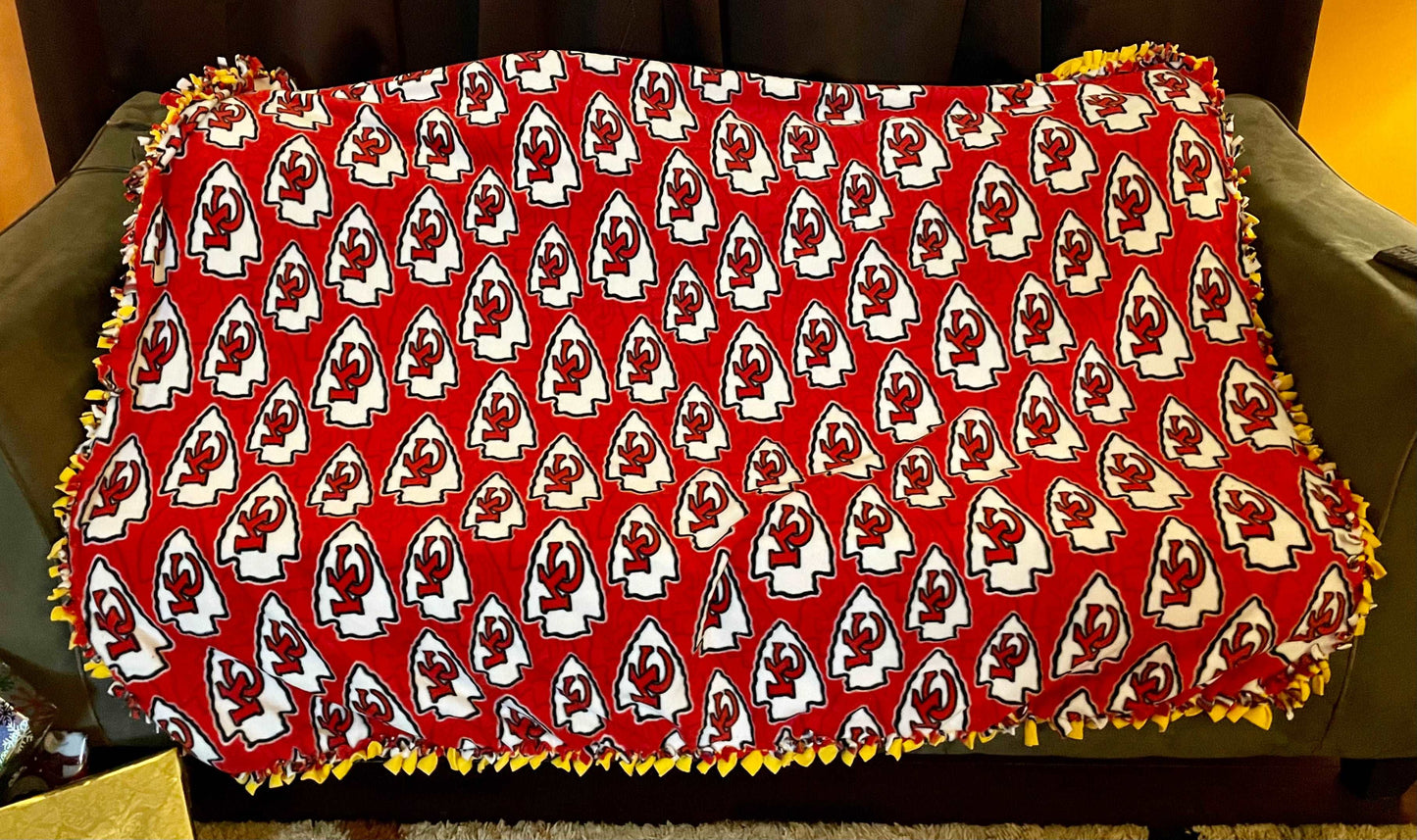 Cuddle up and stay warm with one of my medium size fleece tie knot blankets