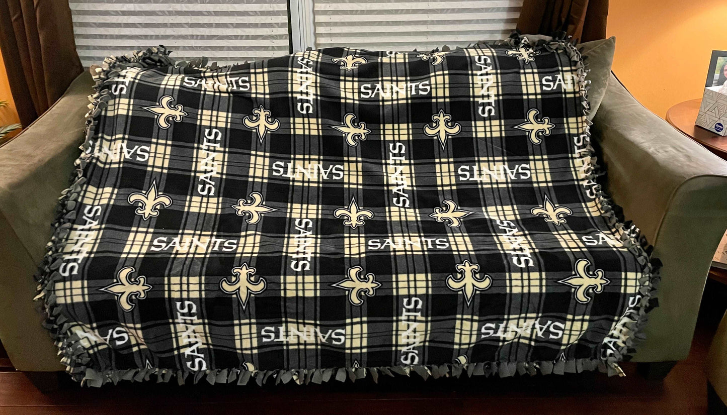 Cuddle up and stay warm with one of my medium size fleece tie knot blankets