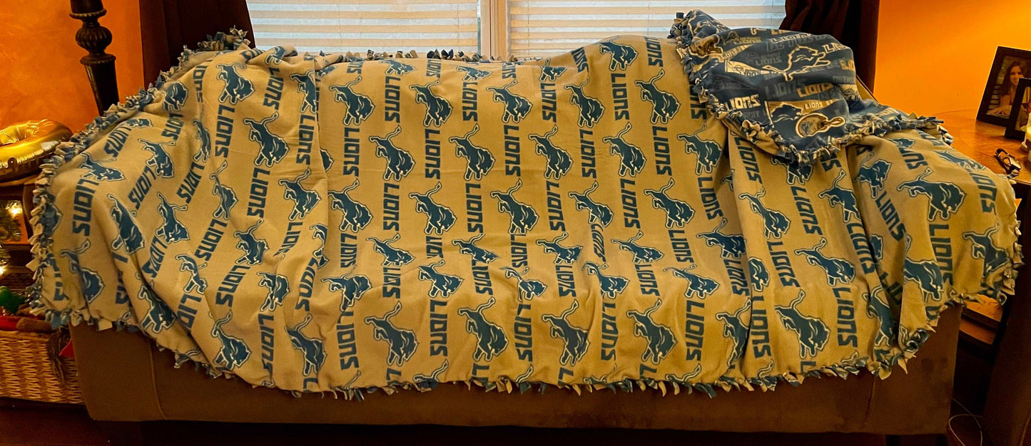 Cuddle up and stay warm with one of my medium size fleece tie knot blankets