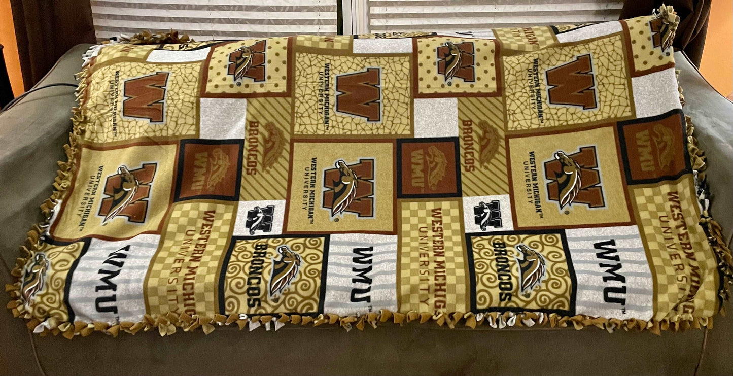 Cuddle up and stay warm with one of my medium size fleece tie knot blankets