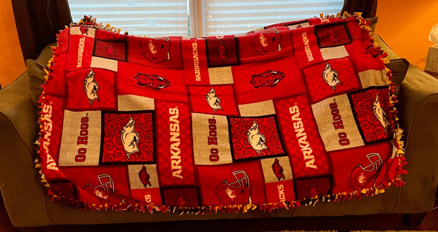 Cuddle up and stay warm with one of my medium size fleece tie knot blankets