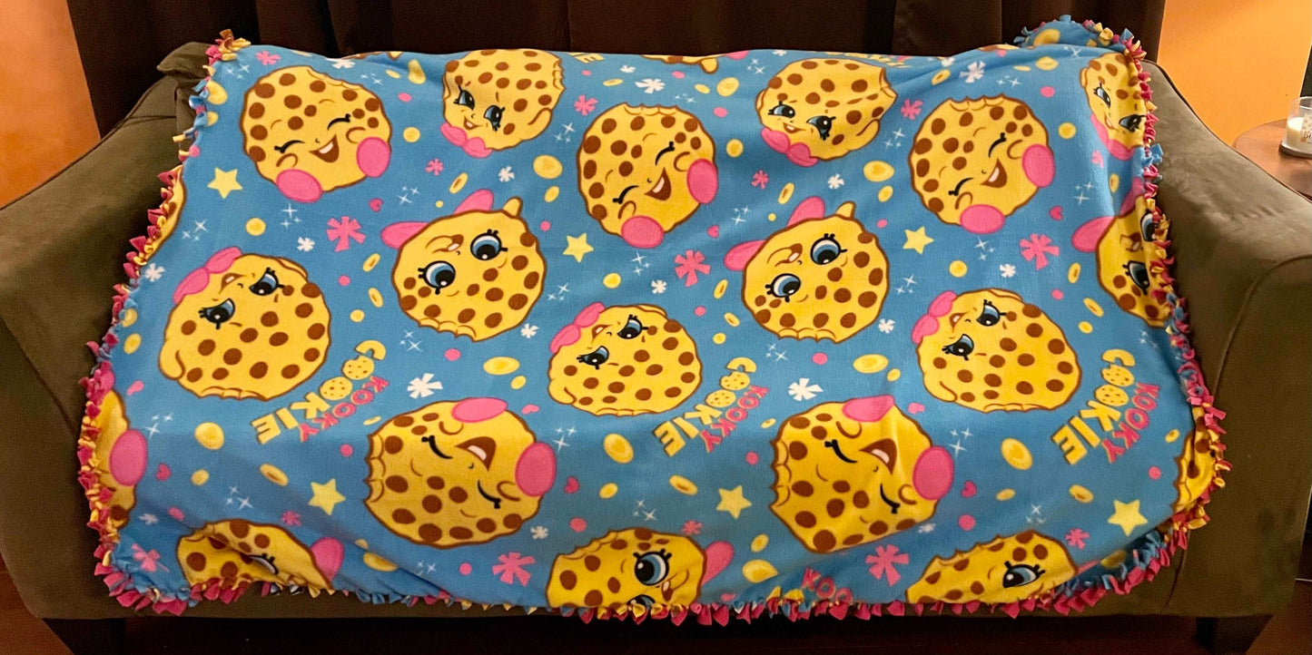 Cuddle up and stay warm with one of my medium size fleece tie knot blankets