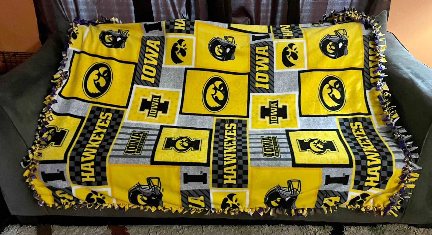 Cuddle up and stay warm with one of my medium size fleece tie knot blankets