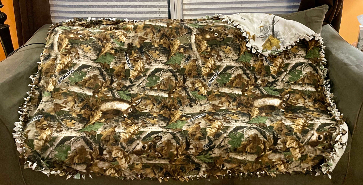 Cuddle up and stay warm with one of my medium size fleece tie knot blankets