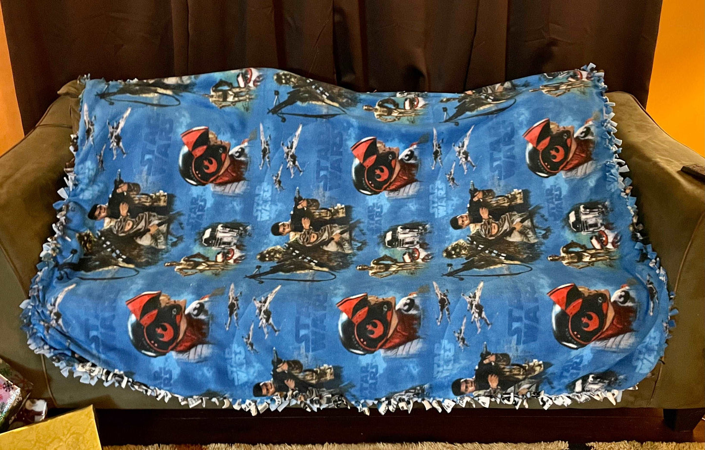 Cuddle up and stay warm with one of my medium size fleece tie knot blankets
