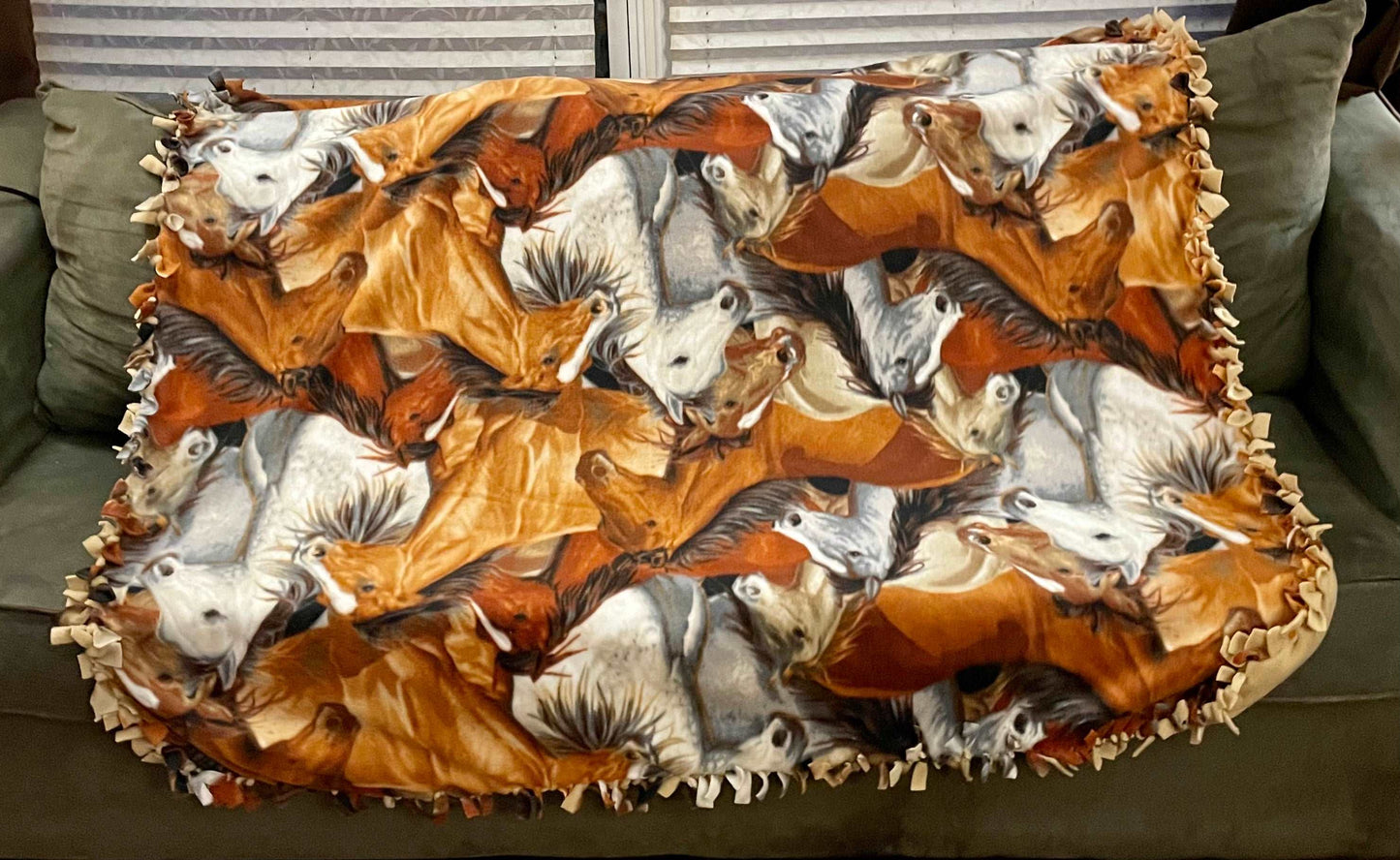 Cuddle up and stay warm with one of my medium size fleece tie knot blankets