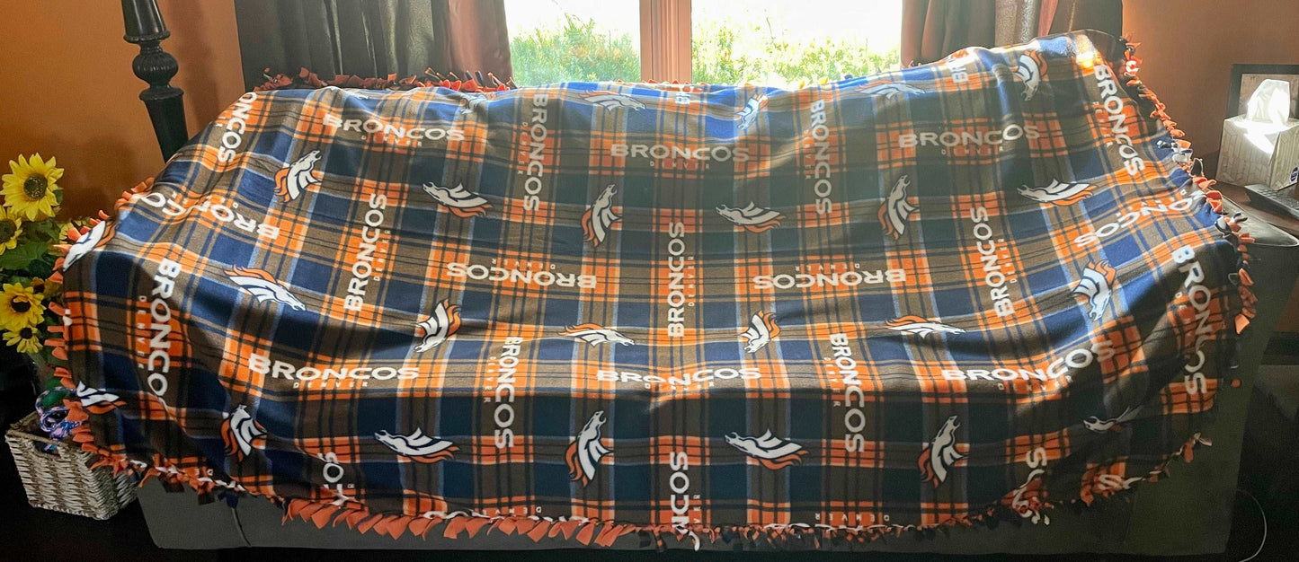 Cuddle up and stay warm with one of my medium size fleece tie knot blankets
