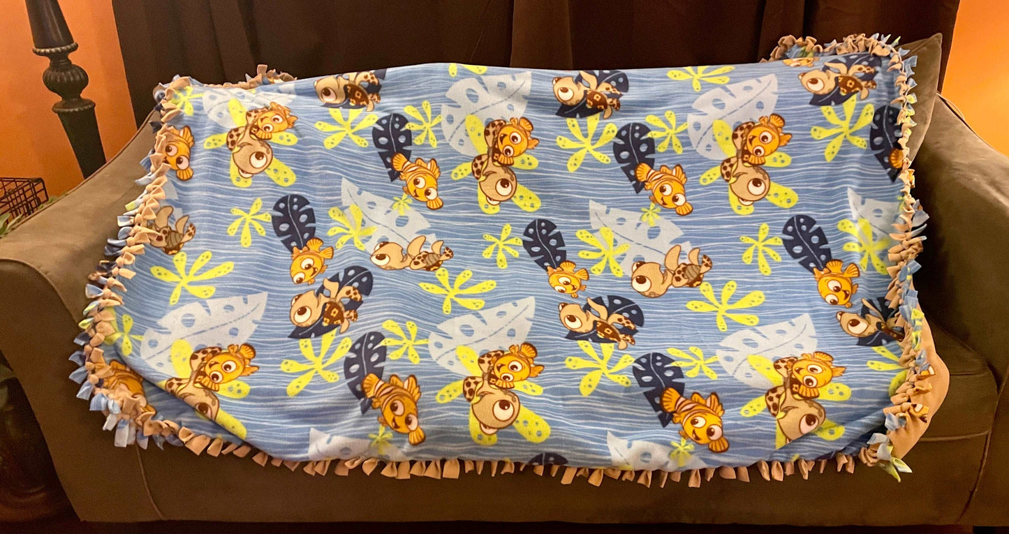 Cuddle up and stay warm with one of my medium size fleece tie knot blankets