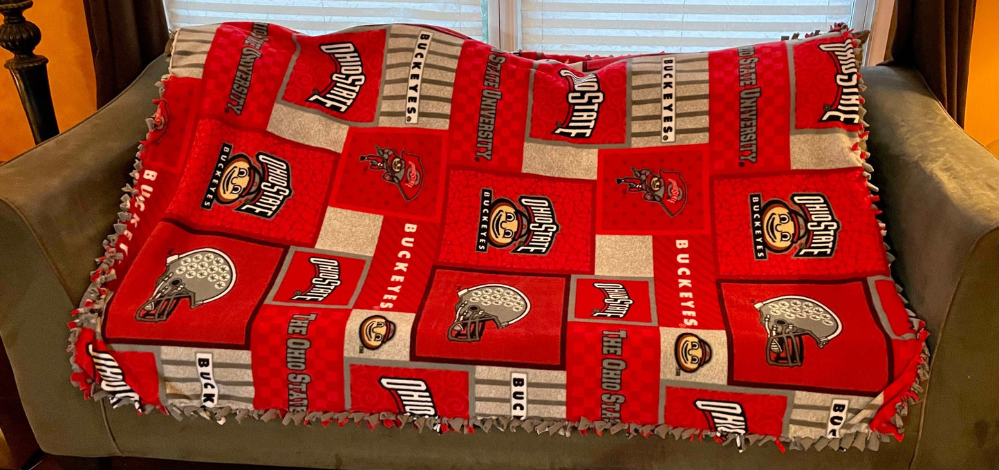 Cuddle up and stay warm with one of my medium size fleece tie knot blankets