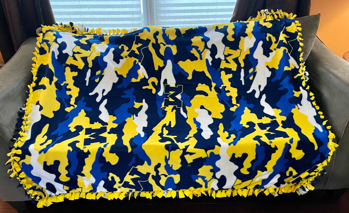Cuddle up and stay warm with one of my medium size fleece tie knot blankets