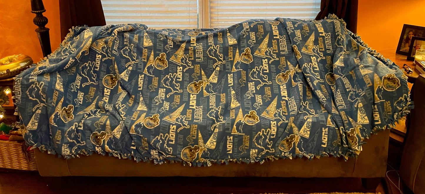 Cuddle up and stay warm with one of my medium size fleece tie knot blankets