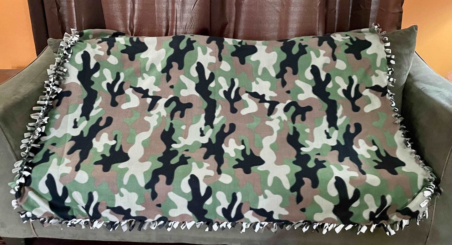 Cuddle up and stay warm with one of my medium size fleece tie knot blankets