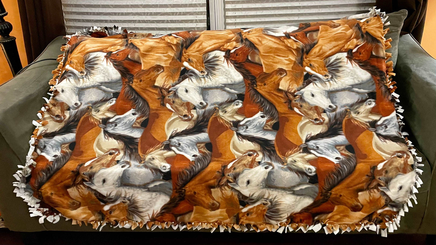Cuddle up and stay warm with one of my medium size fleece tie knot blankets