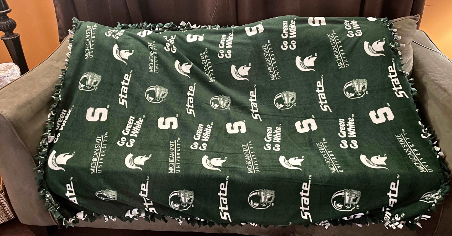 Cuddle up and stay warm with one of my medium size fleece tie knot blankets