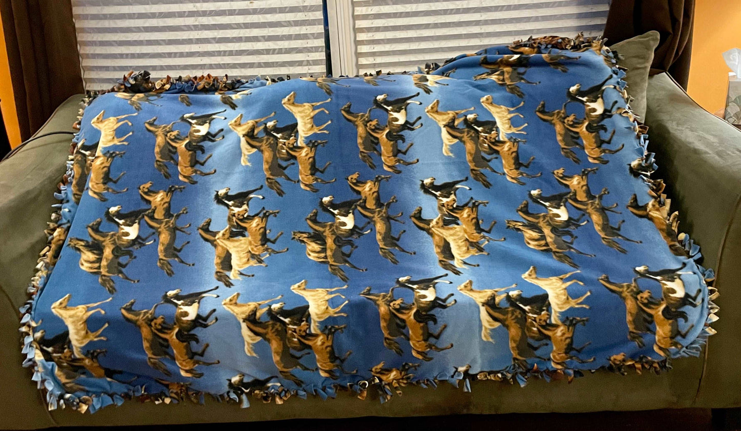 Cuddle up and stay warm with one of my medium size fleece tie knot blankets