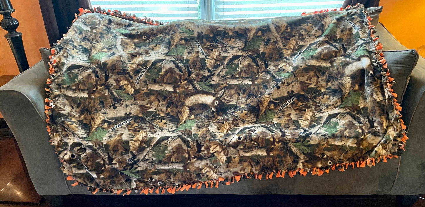 Cuddle up and stay warm with one of my medium size fleece tie knot blankets