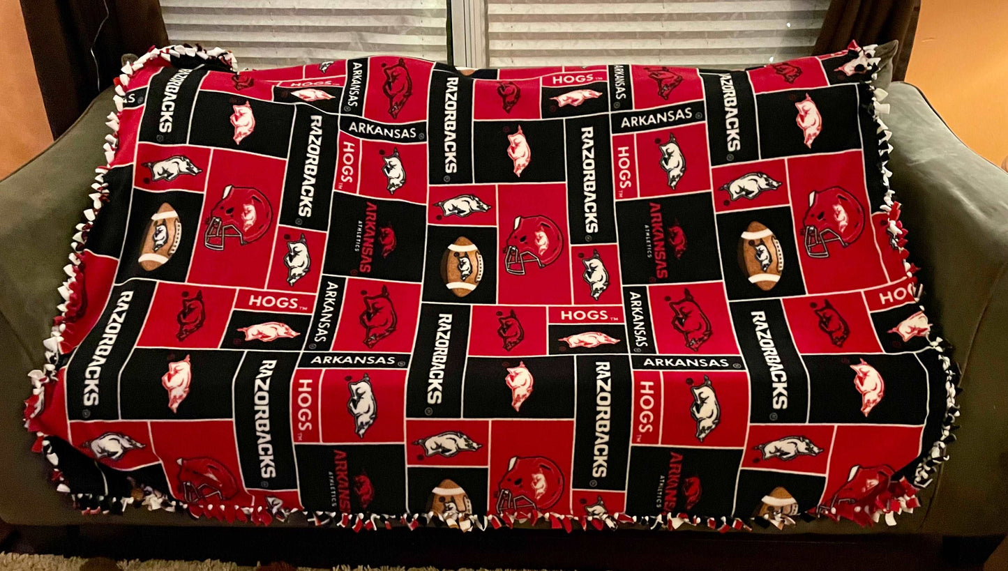 Cuddle up and stay warm with one of my medium size fleece tie knot blankets