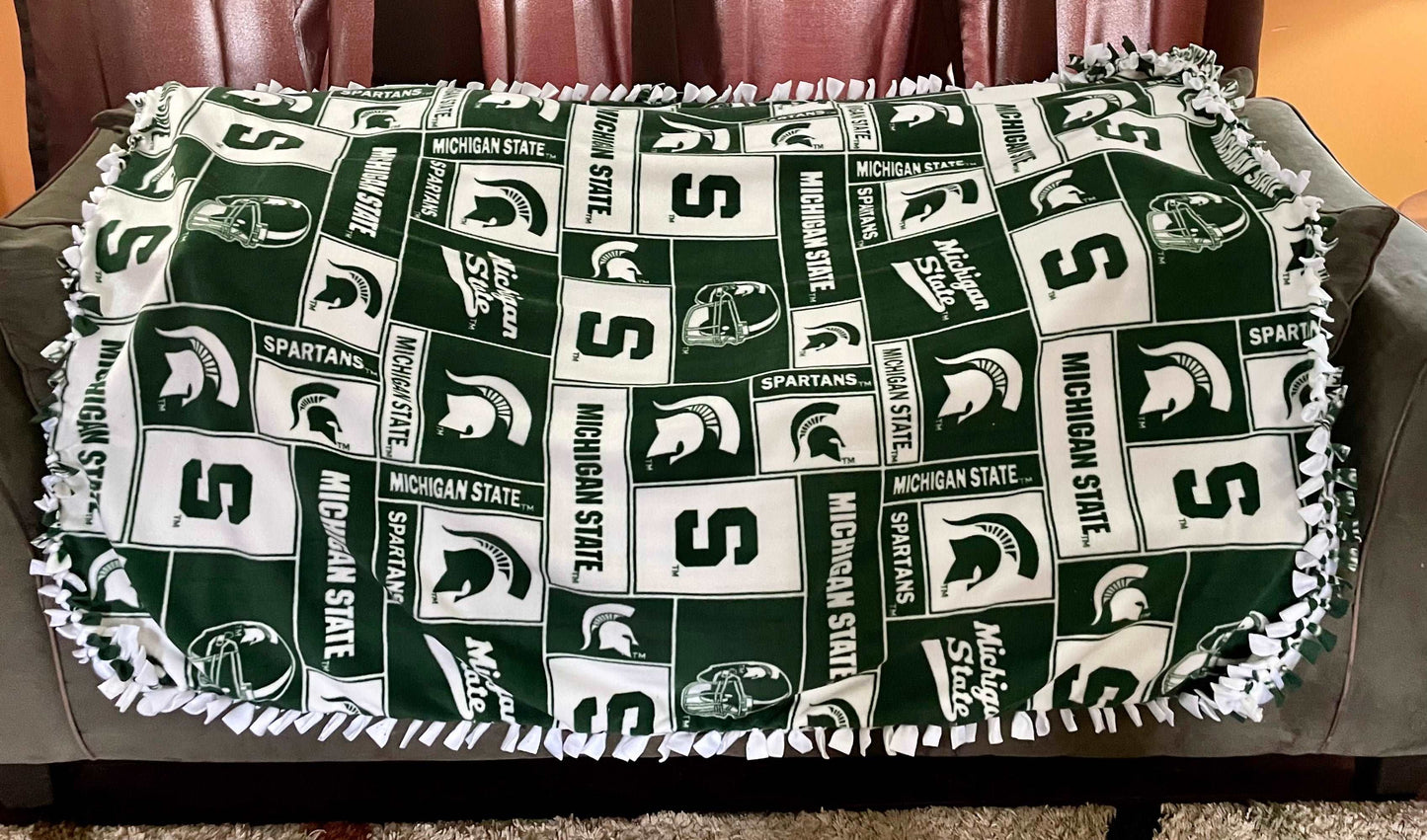 Cuddle up and stay warm with one of my medium size fleece tie knot blankets