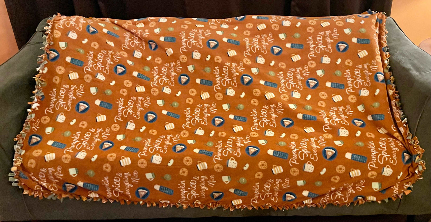 Cuddle up and stay warm with one of my medium size fleece tie knot blankets