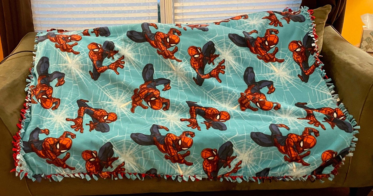 Cuddle up and stay warm with one of my medium size fleece tie knot blankets