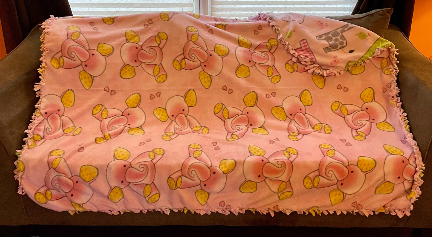 Cuddle up and stay warm with one of my medium size fleece tie knot blankets