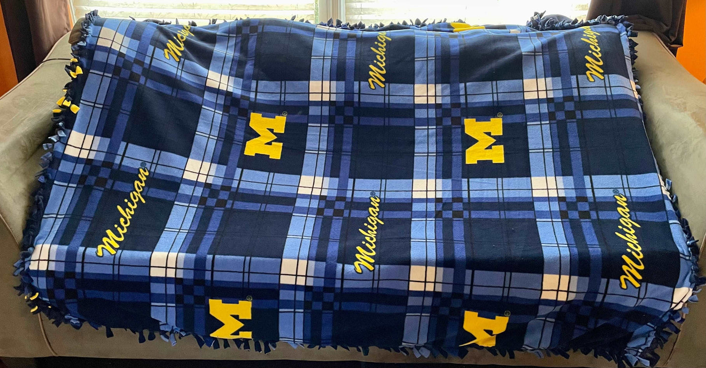 Cuddle up and stay warm with one of my medium size fleece tie knot blankets
