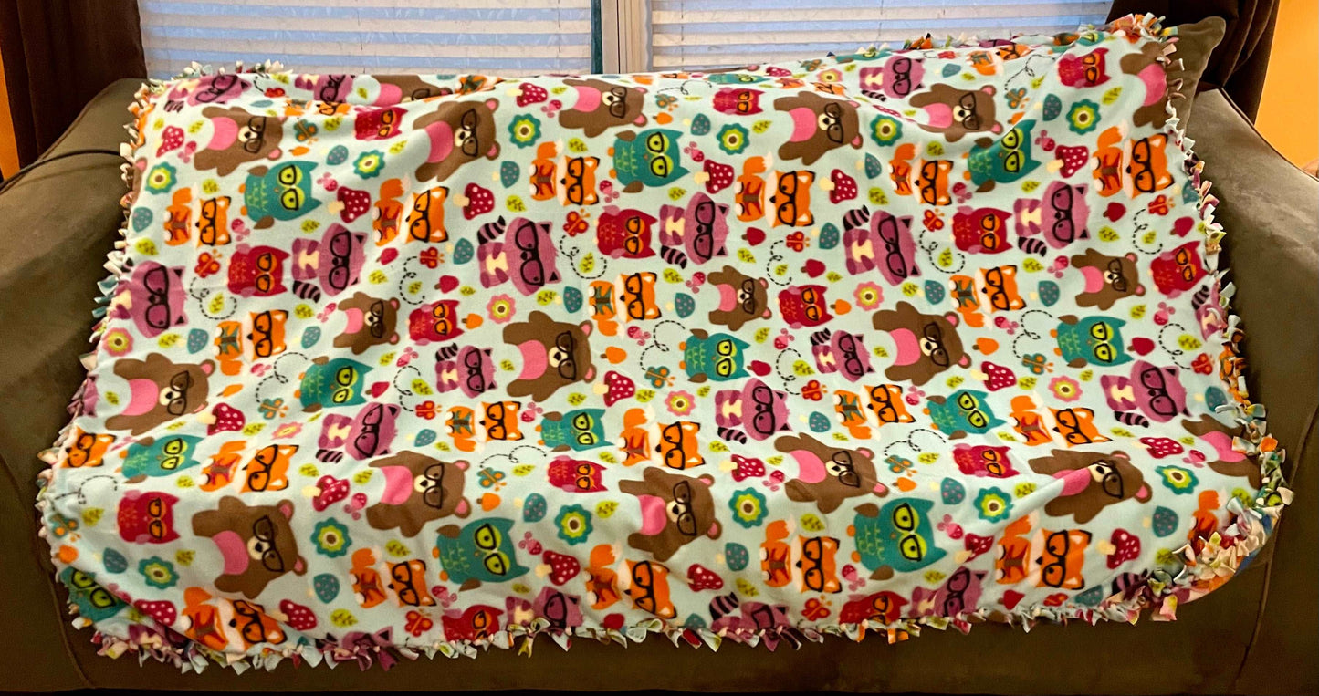 Cuddle up and stay warm with one of my medium size fleece tie knot blankets