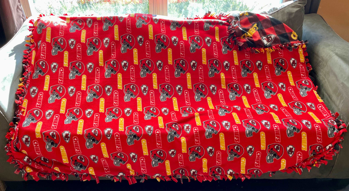 Cuddle up and stay warm with one of my medium size fleece tie knot blankets