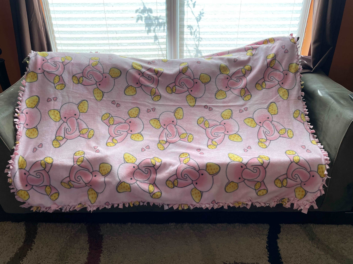 Cuddle up and stay warm with one of my medium size fleece tie knot blankets