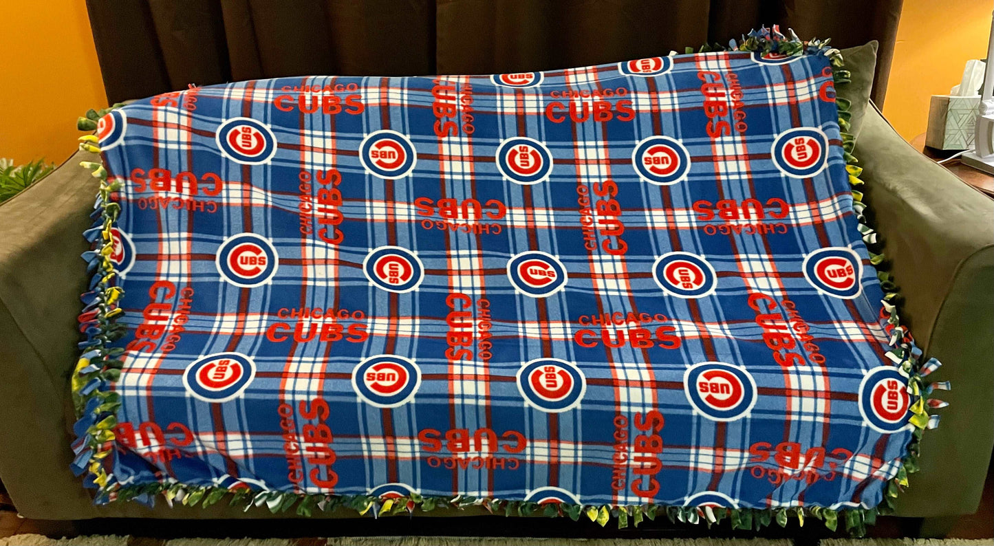 Cuddle up and stay warm with one of my medium size fleece tie knot blankets